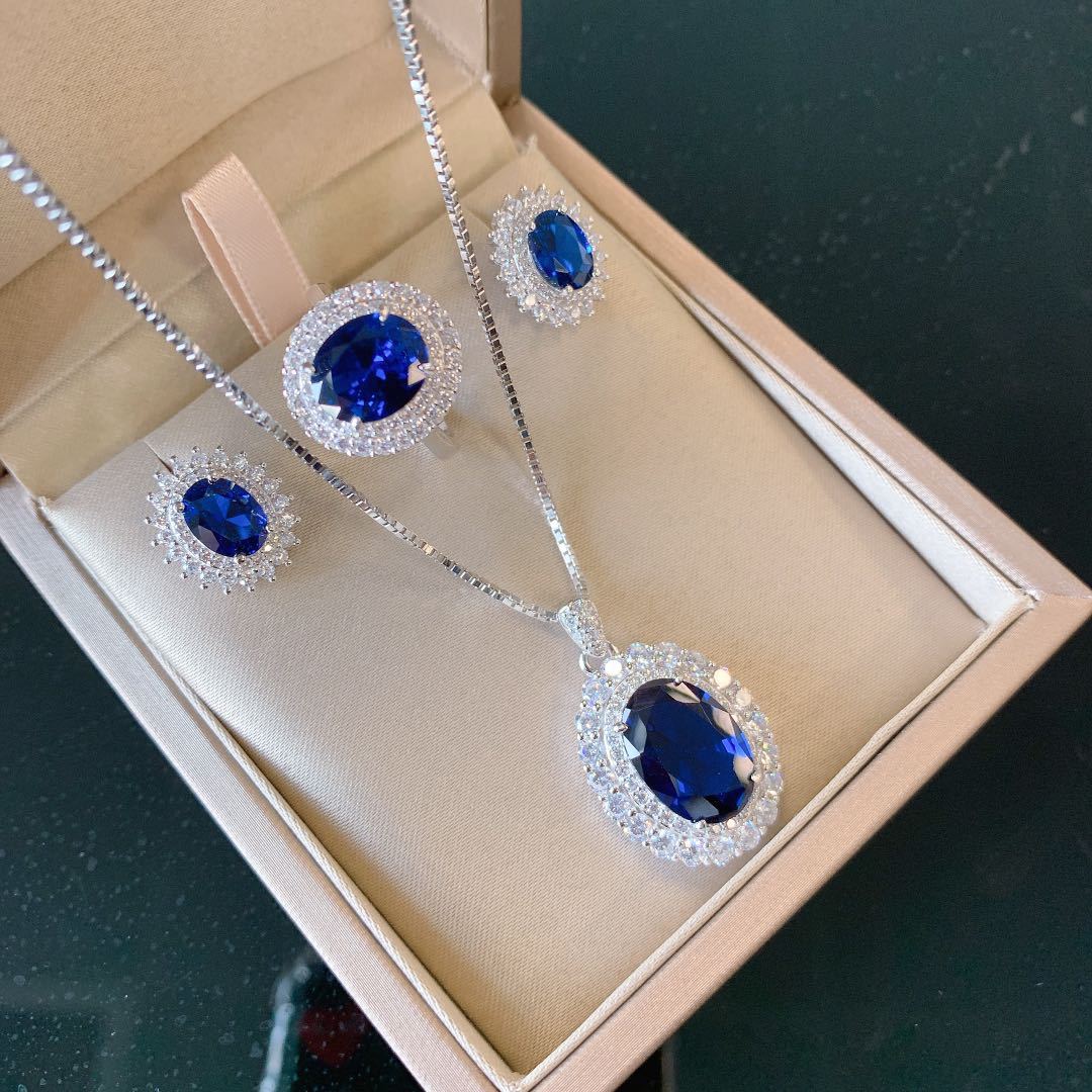 HEM20 S925 Whole Body Silver Jewelry Set Classic Imitation Tanzanite Sapphire Ring Stud Earrings Pendant Three-piece Set