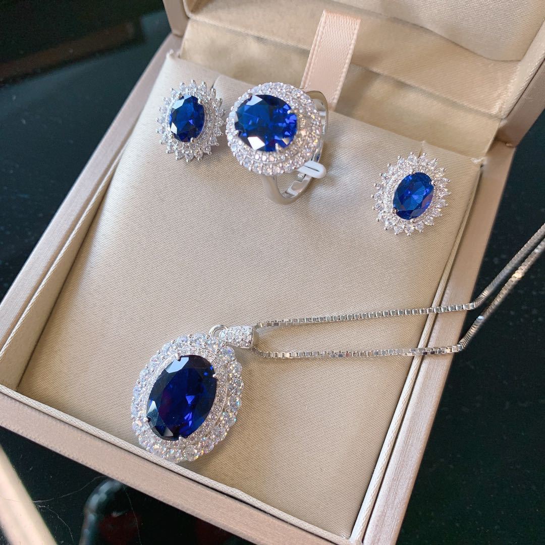 HEM20 S925 Whole Body Silver Jewelry Set Classic Imitation Tanzanite Sapphire Ring Stud Earrings Pendant Three-piece Set